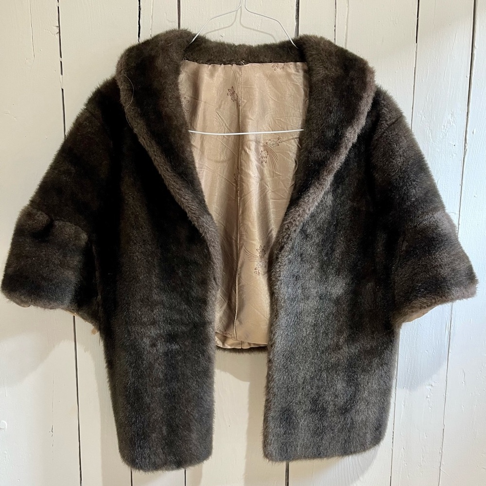 Absolutely beautiful vintage faux fur shawl. Silk lining.